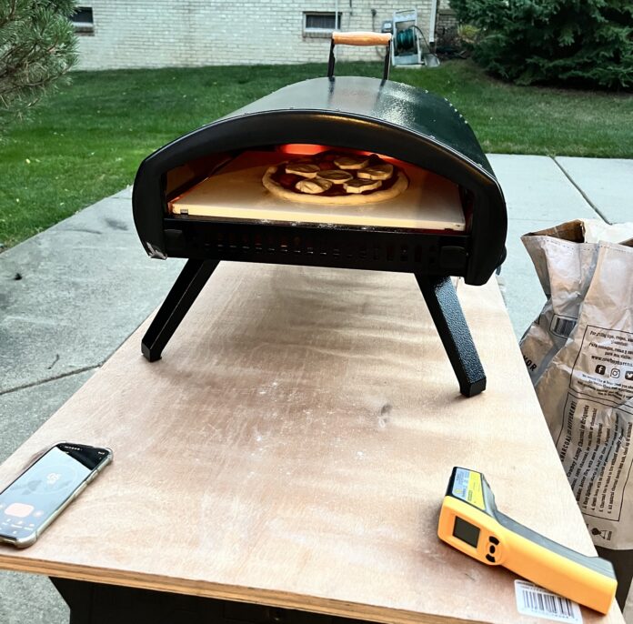 Bertello Pizza Oven Cooking a Pizza