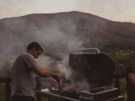 Guy Grilling in the Mountains