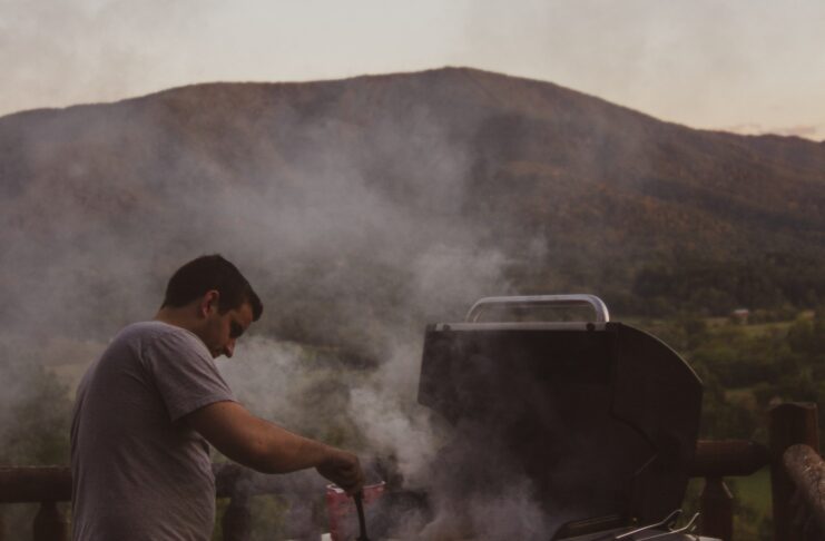 Guy Grilling in the Mountains