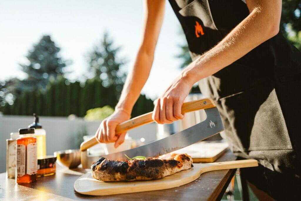 Cutting a Pizza with a Solo Stove Pizza Rocker