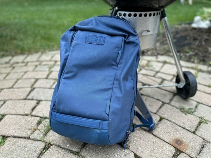 Yeti Crossroads Backpack in Front of a Weber Kettle Grill