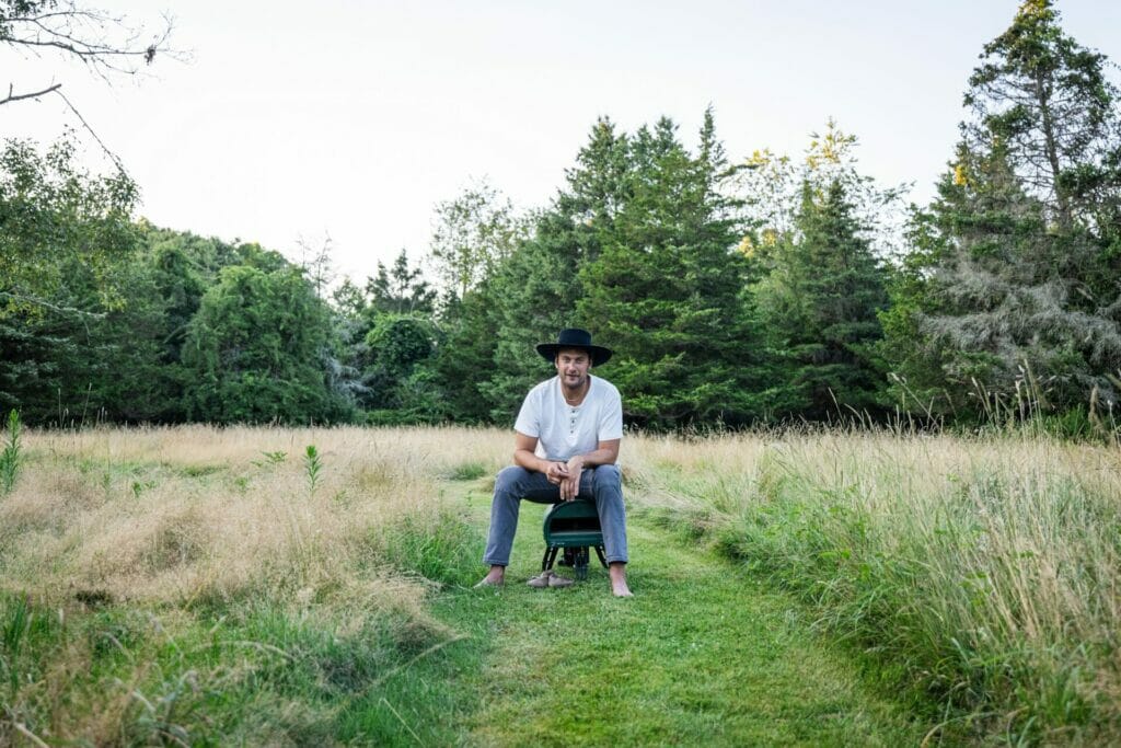 Brad Leone Sitting on a Gozney Roccbox Pizza Oven