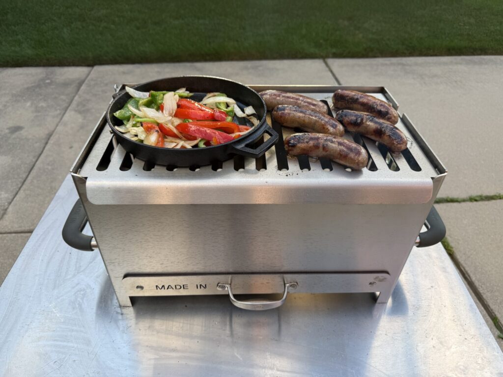 Made In Grill Cooking Sausage and Peppers